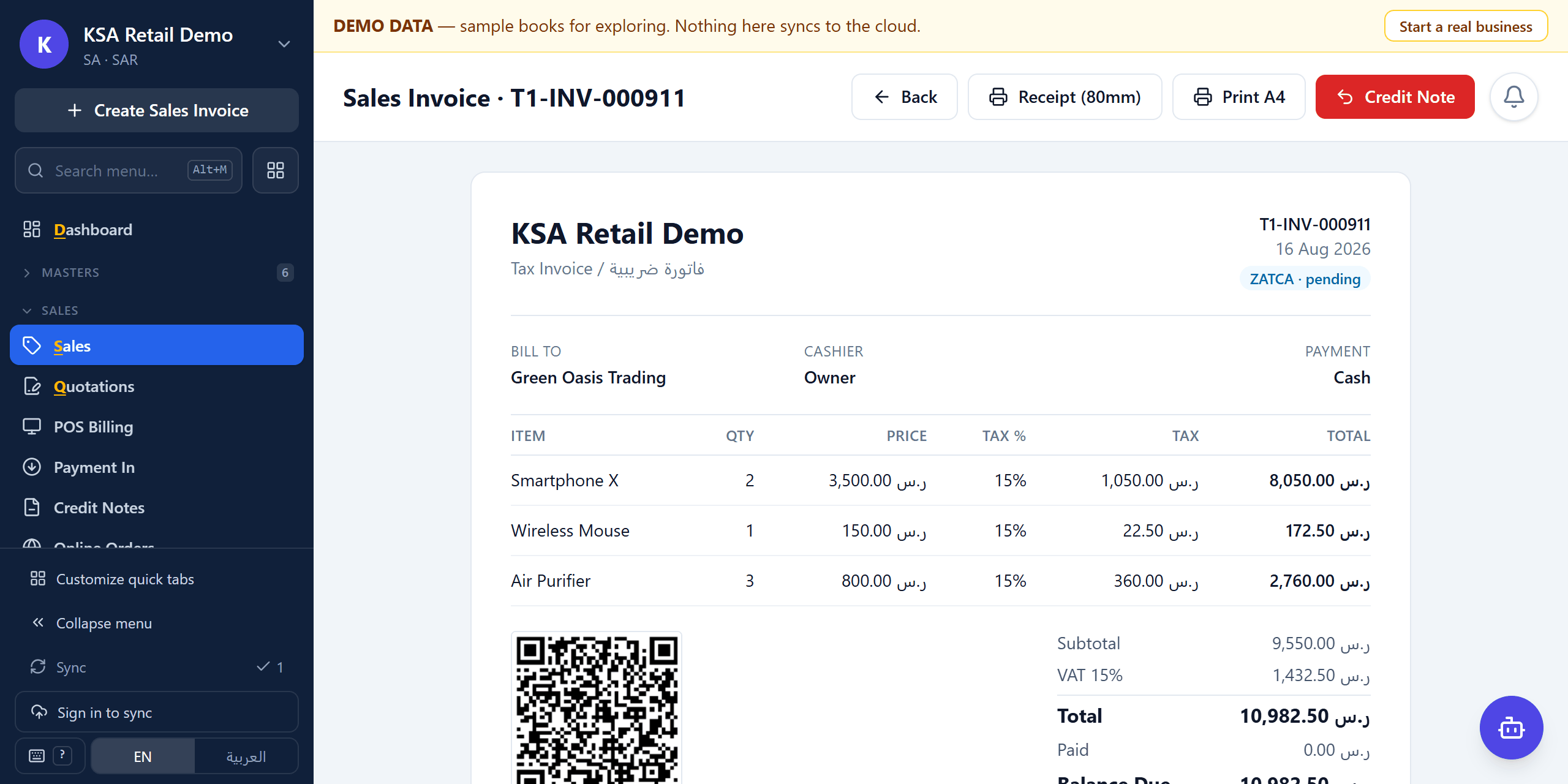 A posted tax invoice, bilingual Arabic and English, with line items, 15% VAT and the ZATCA QR code